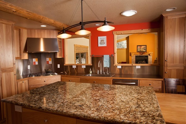 Kitchen looks into the huge living room