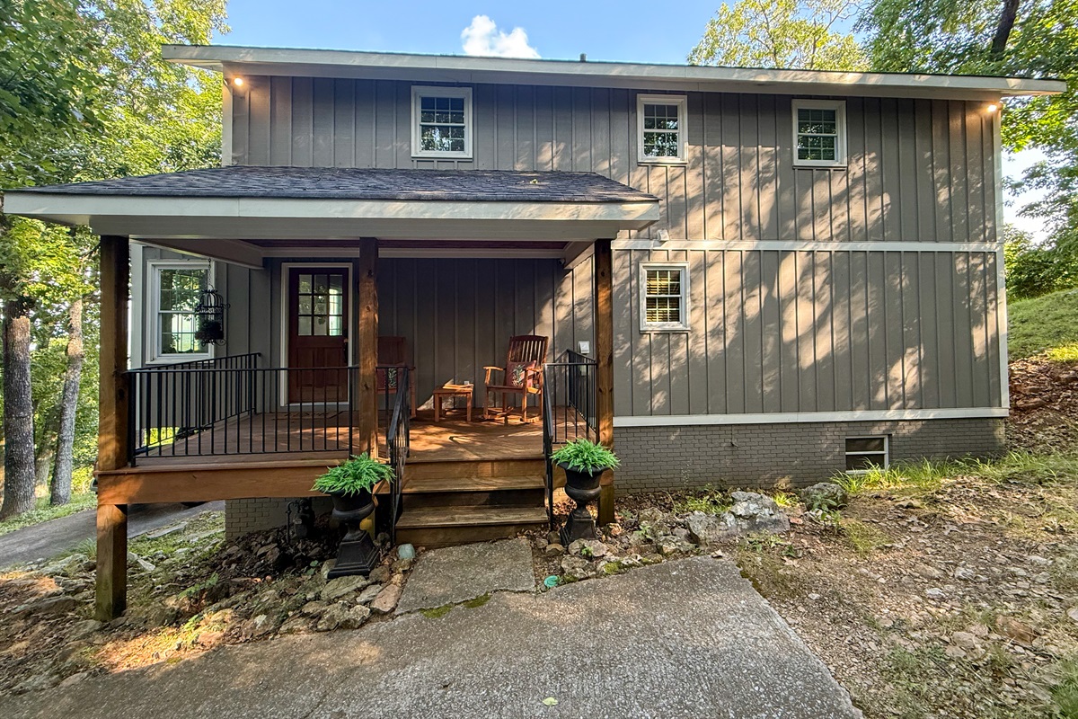 The front porch serves as an inviting entry and exit through the main door.
