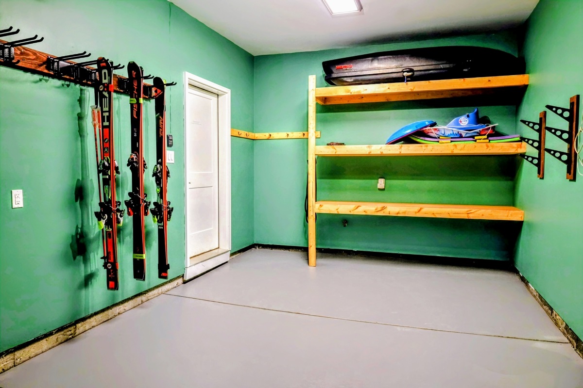 North Garage #1, with ski racks for 16 pairs of skis and 6 snowboards, plus storage for guest luggage