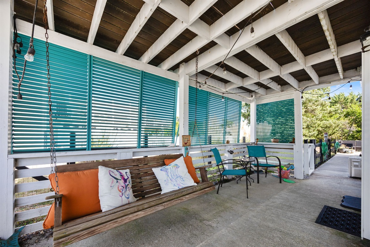 Downstairs Swing and sitting area outside the downstairs entrance