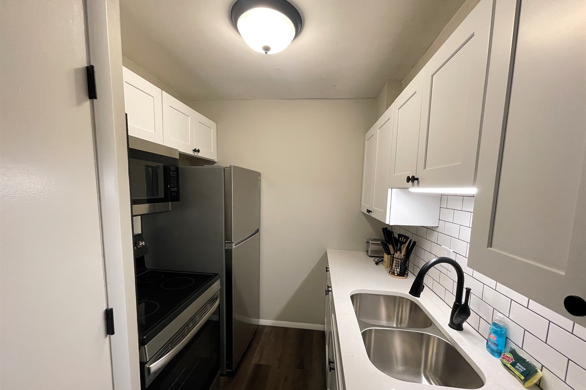 Kitchen with full size appliances and dishwasher