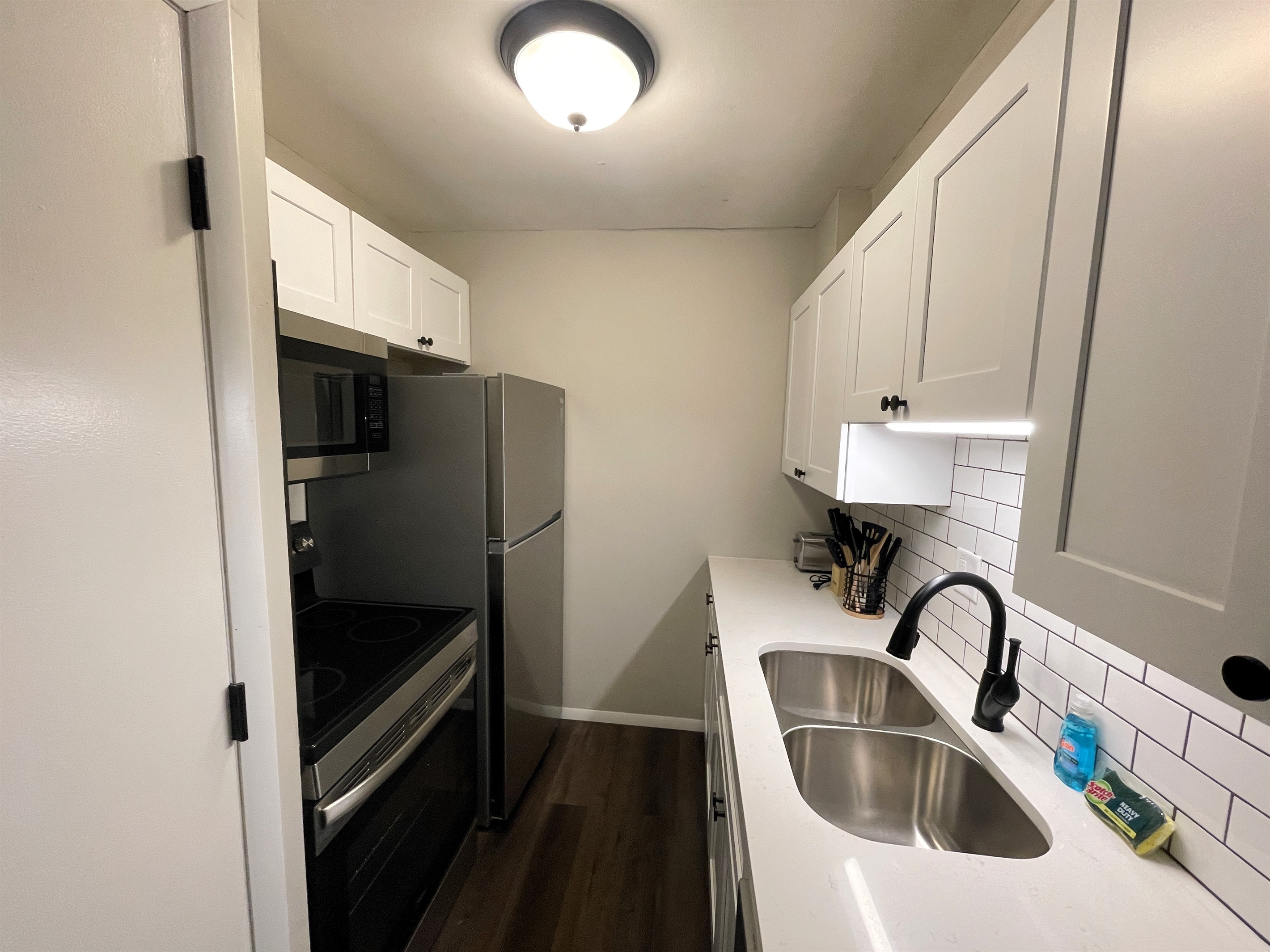 Kitchen with full size appliances and dishwasher