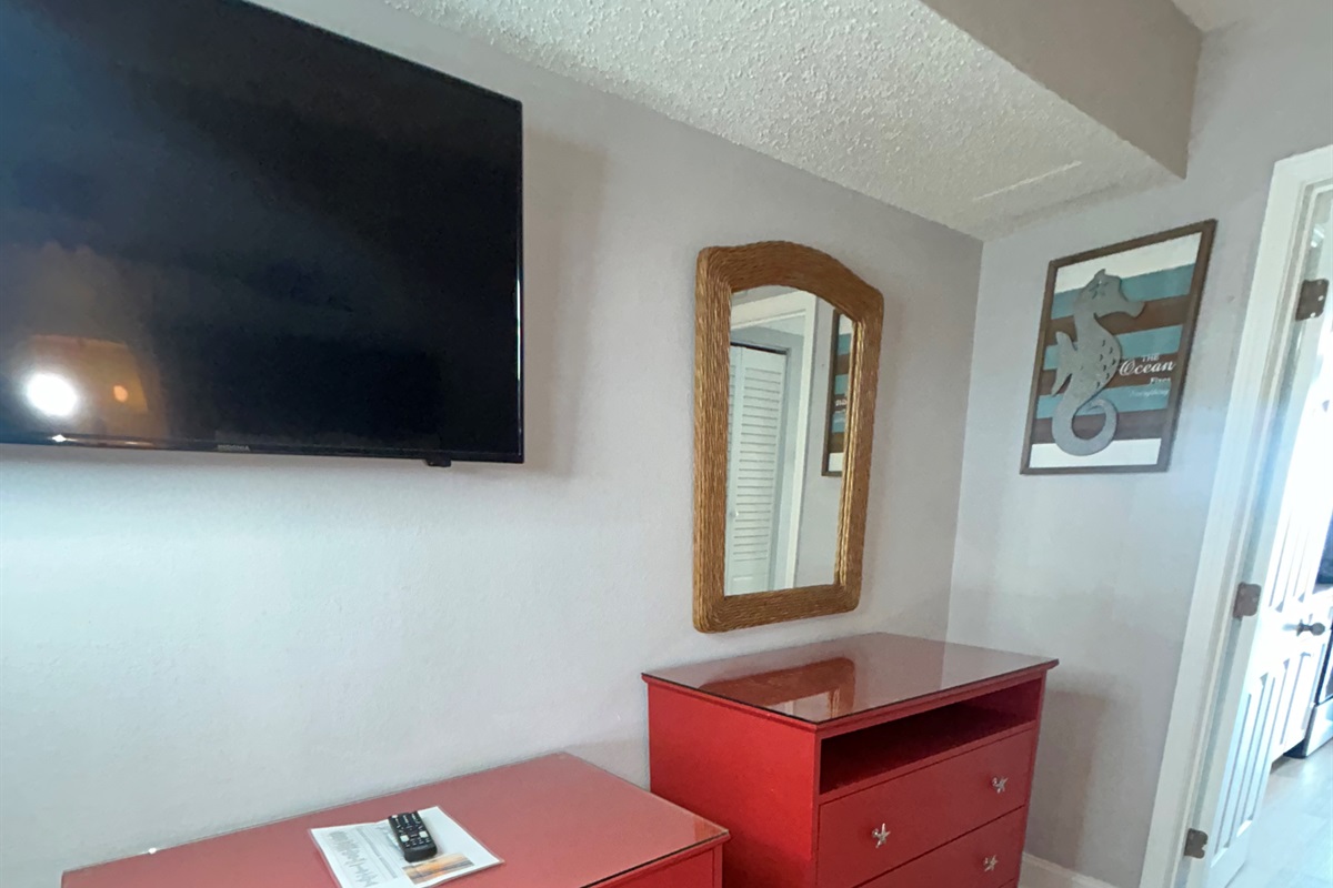Large TV in Bedroom with 2 Dressers
