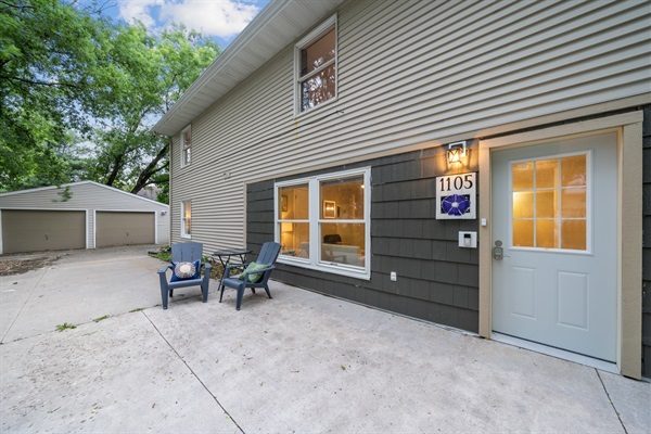 The exterior patio area and entrance to the lower Morning Glory Apartment. There is a 36" wide door for wheelchair accessibility.