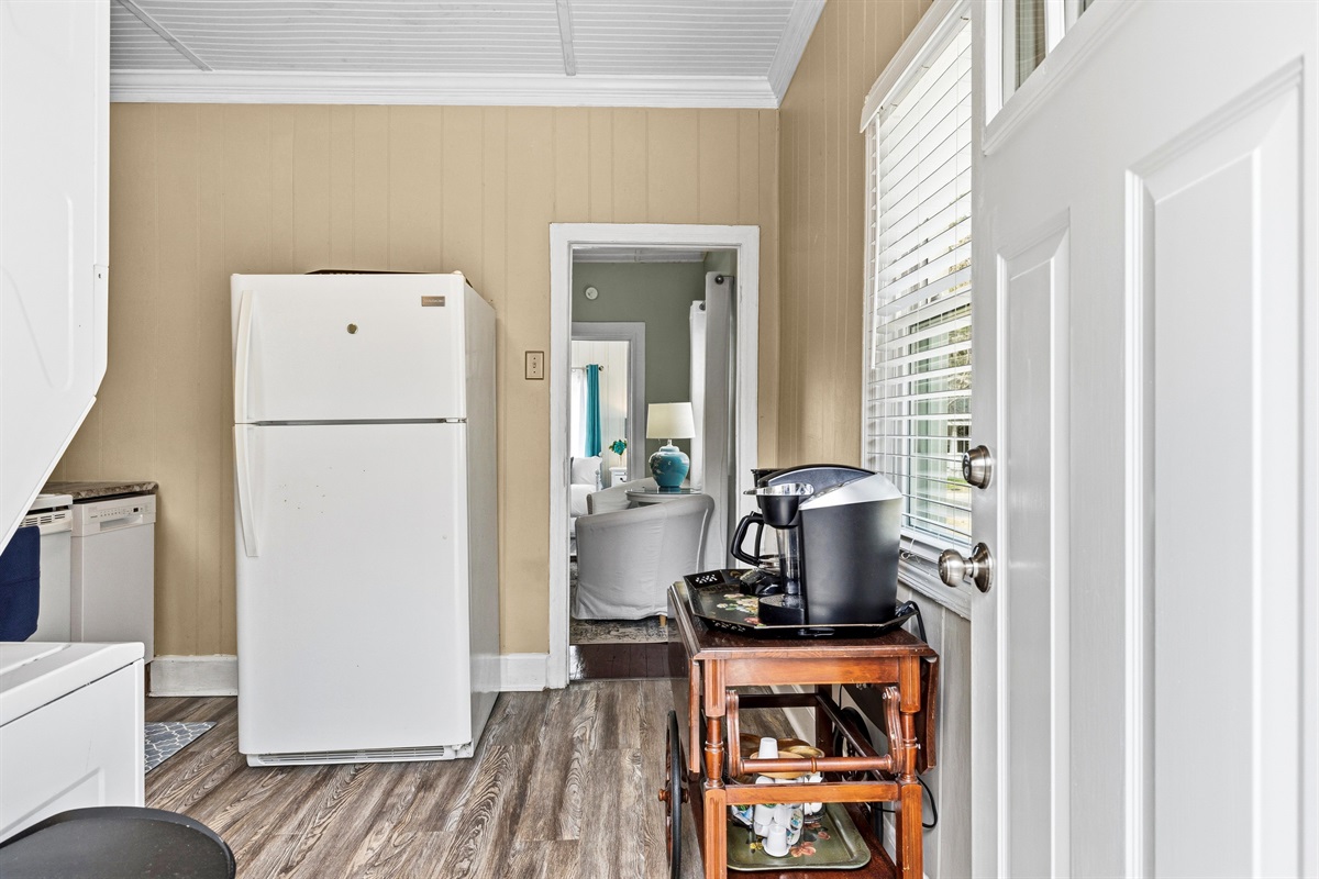 The kitchen includes a tea cart with a coffee maker, Keurig and kettle for guest use. 