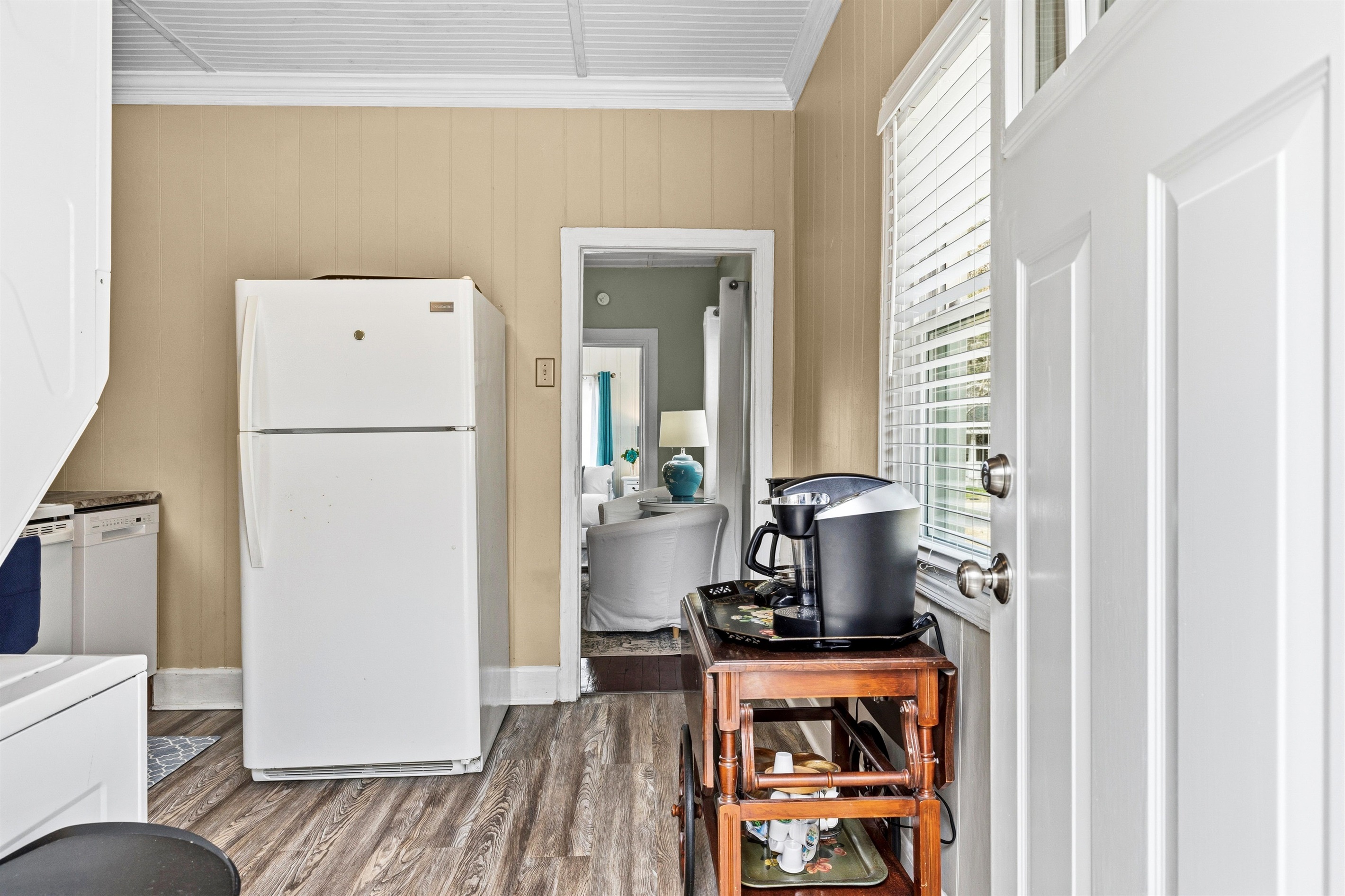 The kitchen includes a tea cart with a coffee maker, Keurig and kettle for guest use. 