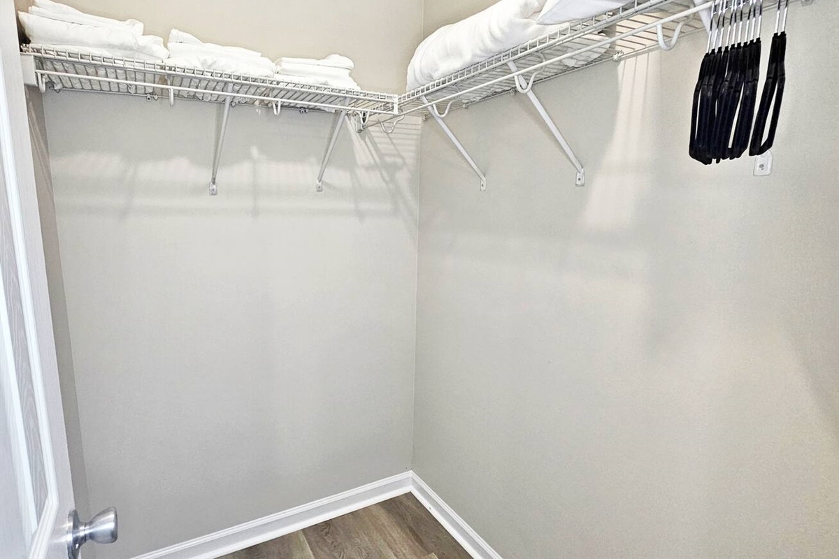 Plenty of extra sheets, blankets, and pillows.