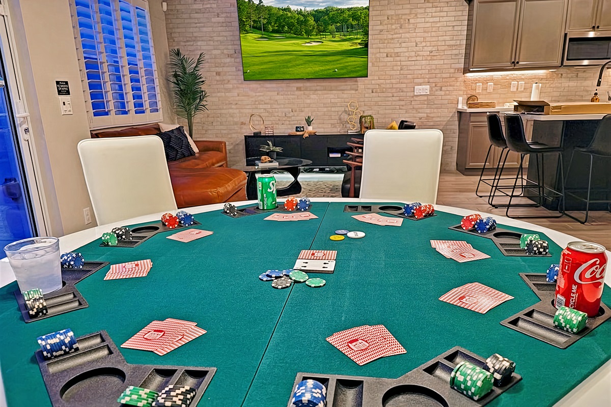 The dining table easily converts to a poker table!