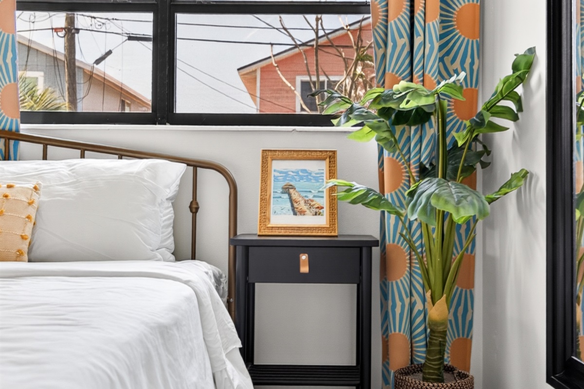 Sun Bedroom: King bed with mix of firm and soft sleeping pillows.