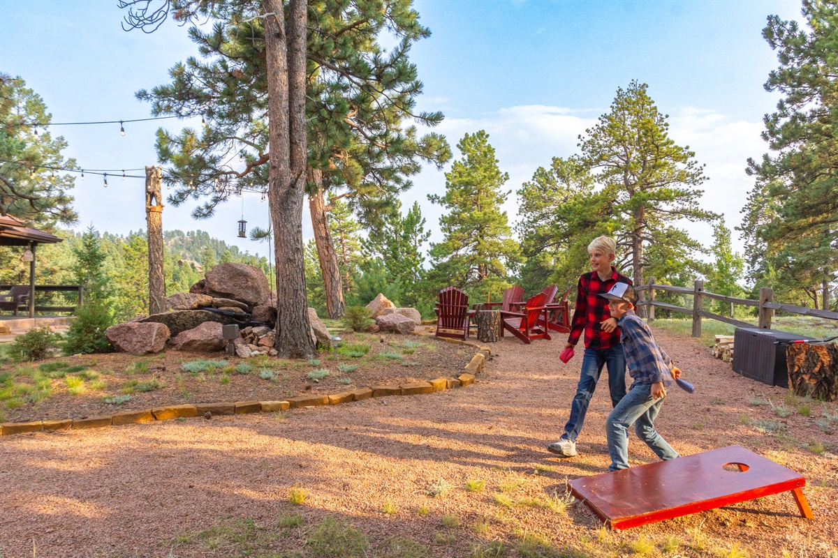Play a game of cornhole.