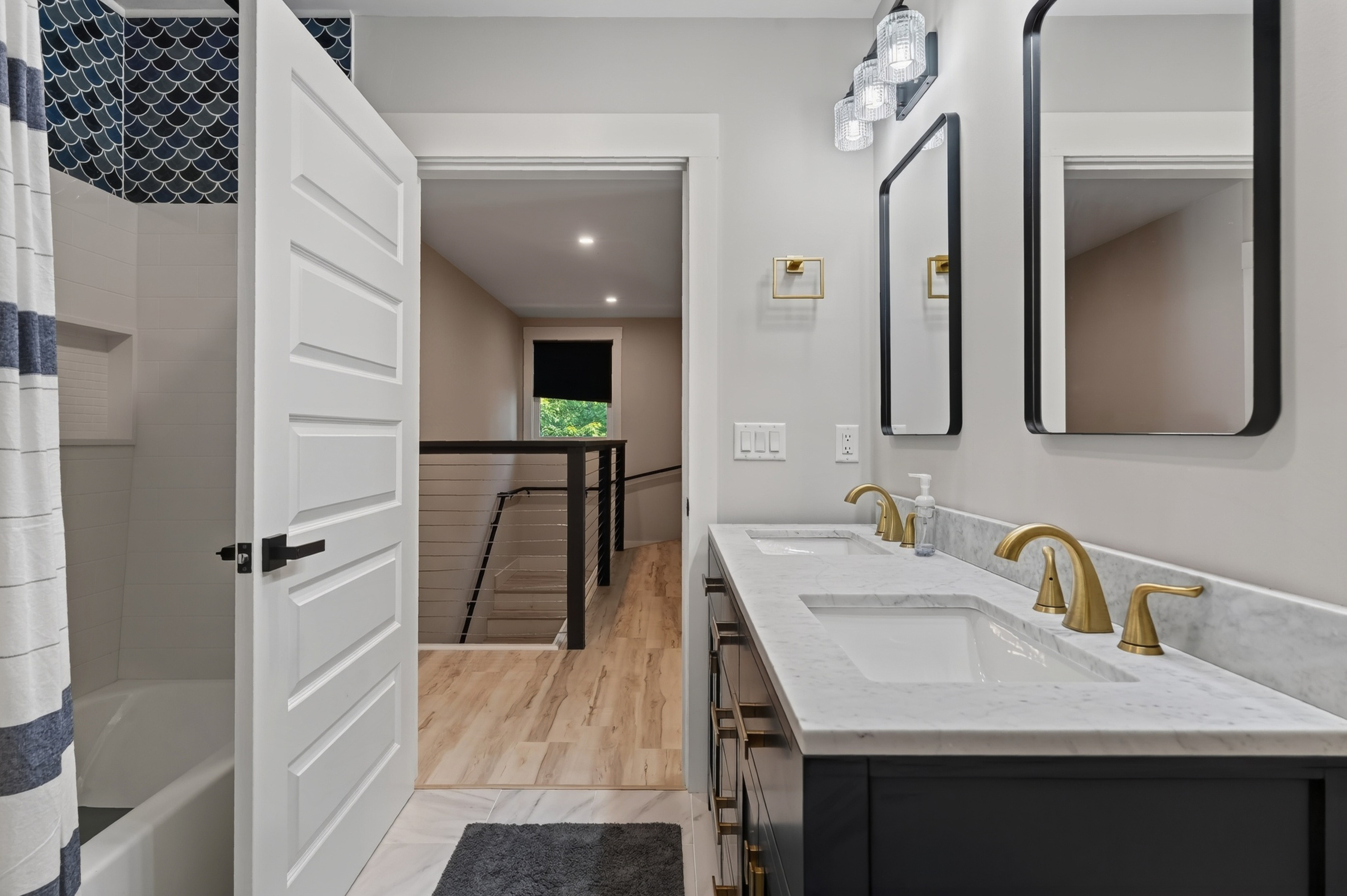 Two sinks and a tub-shower make group mornings easier and considerably more civilized.