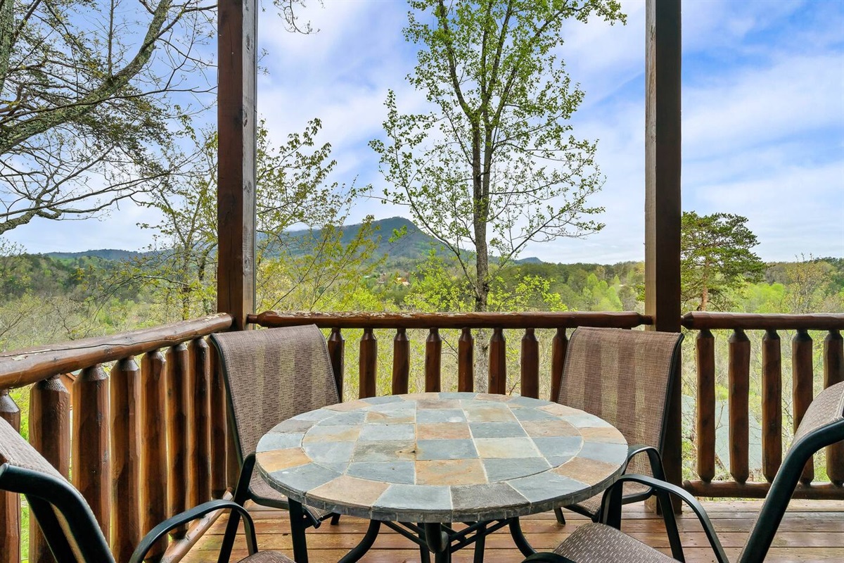 Outdoor dining area located on the lower deck.