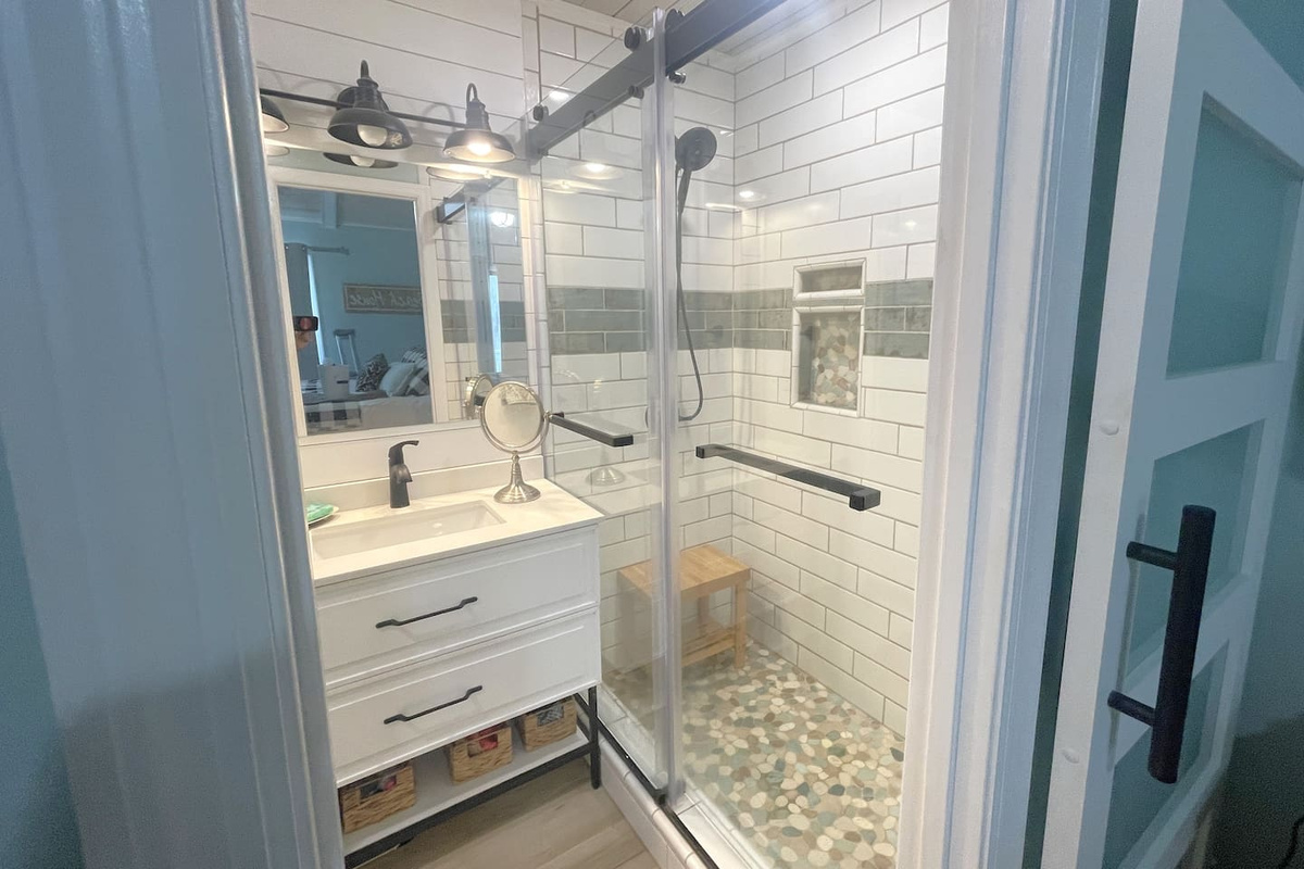Step into your master suite shower and take your time &mdash; large tiled walk-in, plenty of room, no rushing the group out.