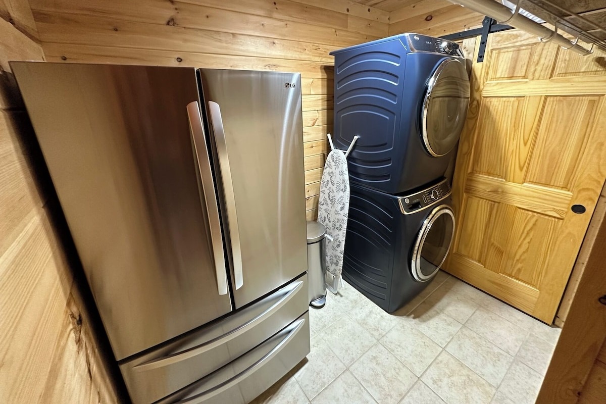 Laundry room has 2 very large front load top of the line GE washer and dryer as well as a 2nd refrigerator/freezer for storing extra food that did not fit in the 1st refrigerator/freezer in the kitchen 