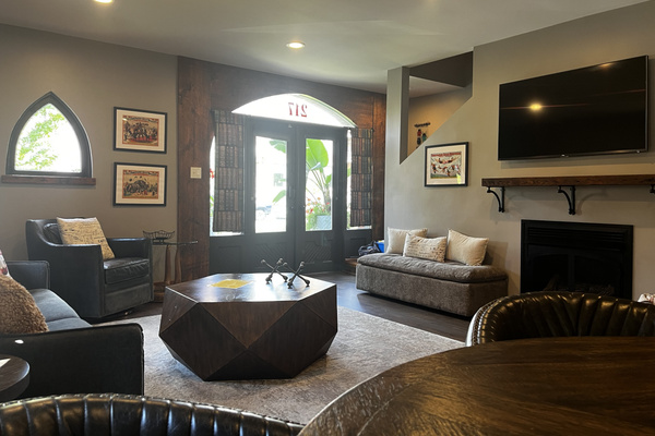 Living area with fireplace, Roku TV and French doors to the front