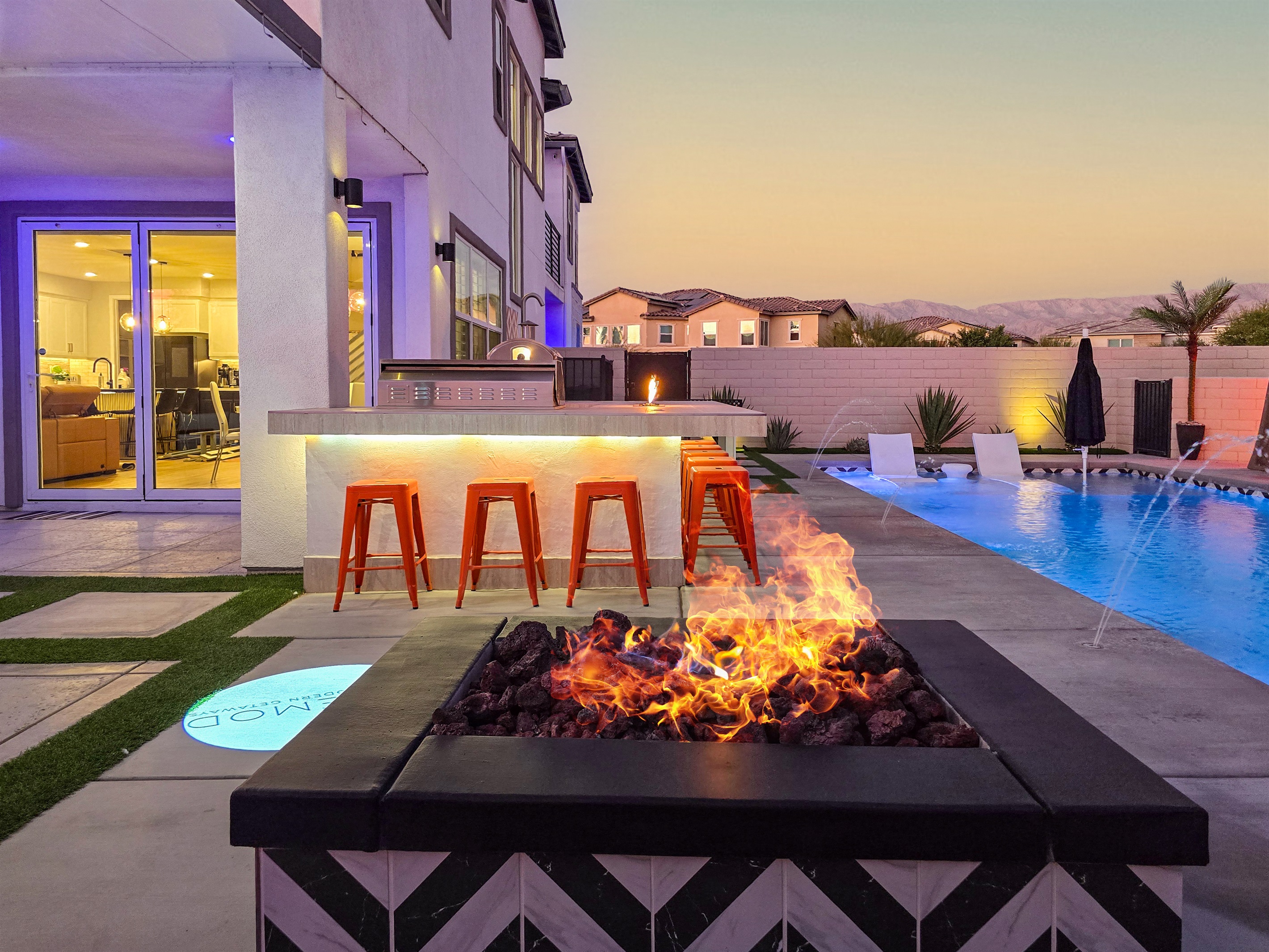 This custom firepit is the perfect gathering spot at the end of the day.