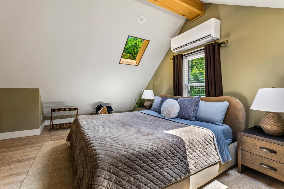 Master Bedroom with King Bed, 42-inch Smart TV, Fireplace, sound machine, blackout curtains and cozy reading chair