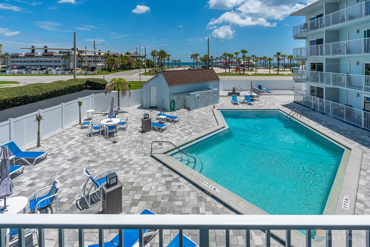 Beautiful Community Pool with Sun Loungers