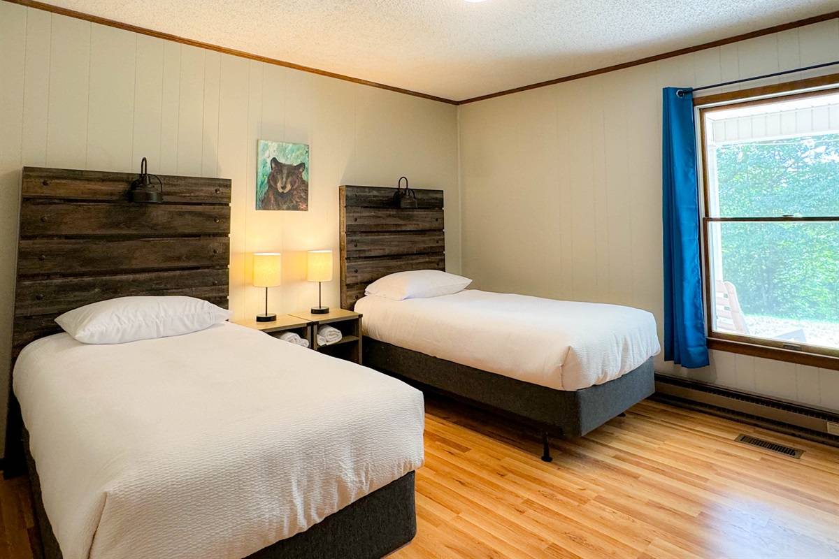 The twin guest room features two twin size beds with the same comfortable high thread count linens and pillows.