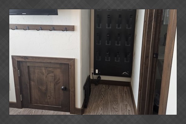 Boot drying machine next to bathroom.