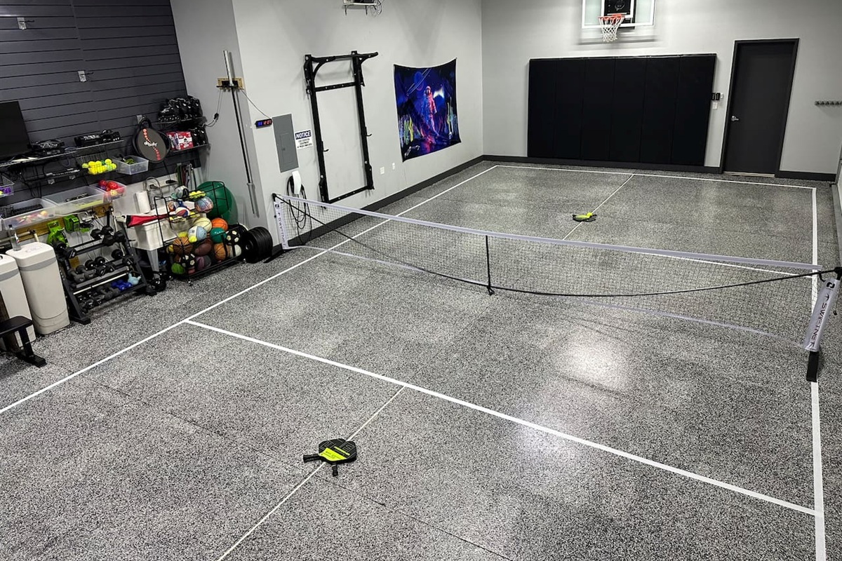 Pickleball court inside the garage with quick setup swiftnet pickleball net