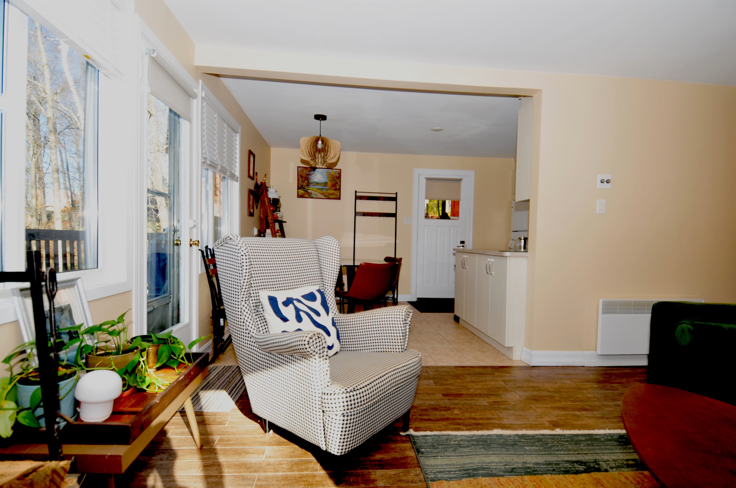 View of dining area and kitchen from living room