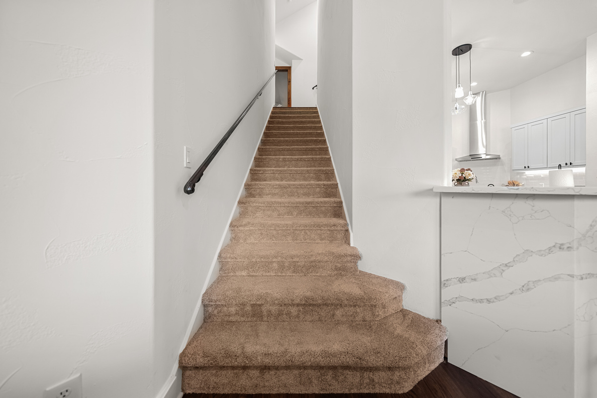 Follow the stairs upstairs to discover more spaces to relax and unwind.