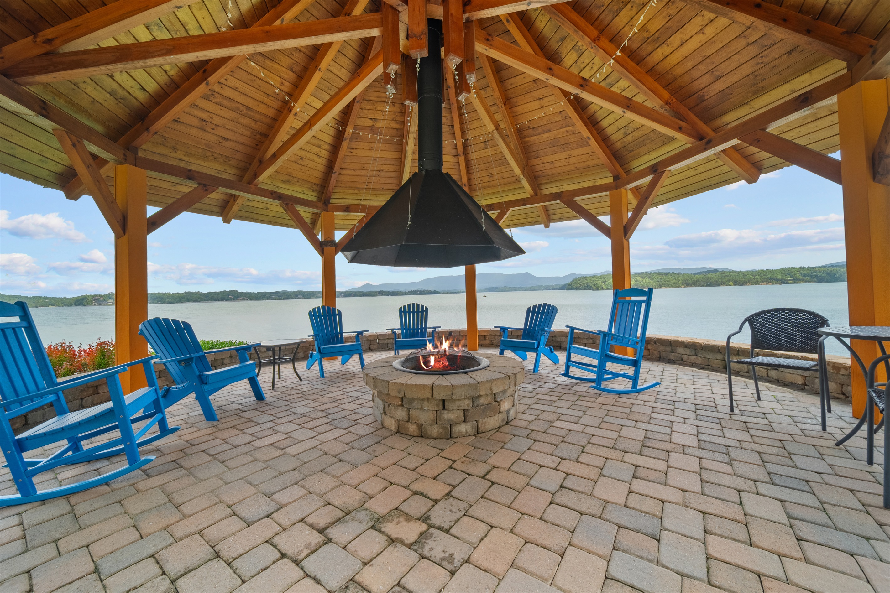 Shaded Sitting Area & Fire Pit right on the lake