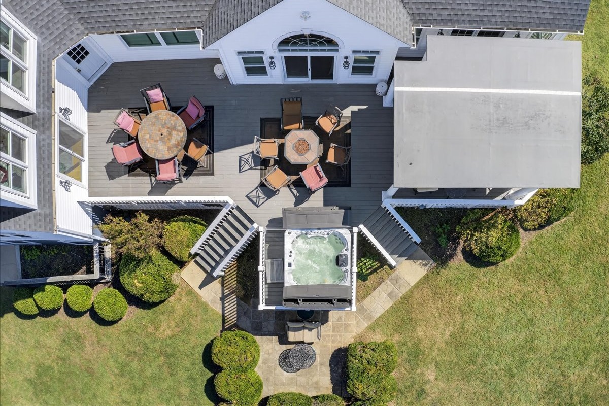 Cook, relax, and unwind outdoors with a grill, hot tub, and firepit for the whole family to enjoy.