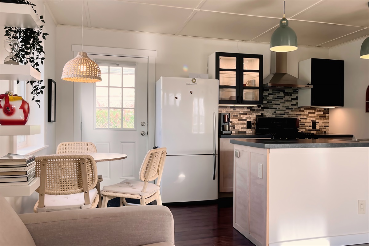 Light-filled dining nook — enjoy local wine, takeout, or a home-cooked meal.