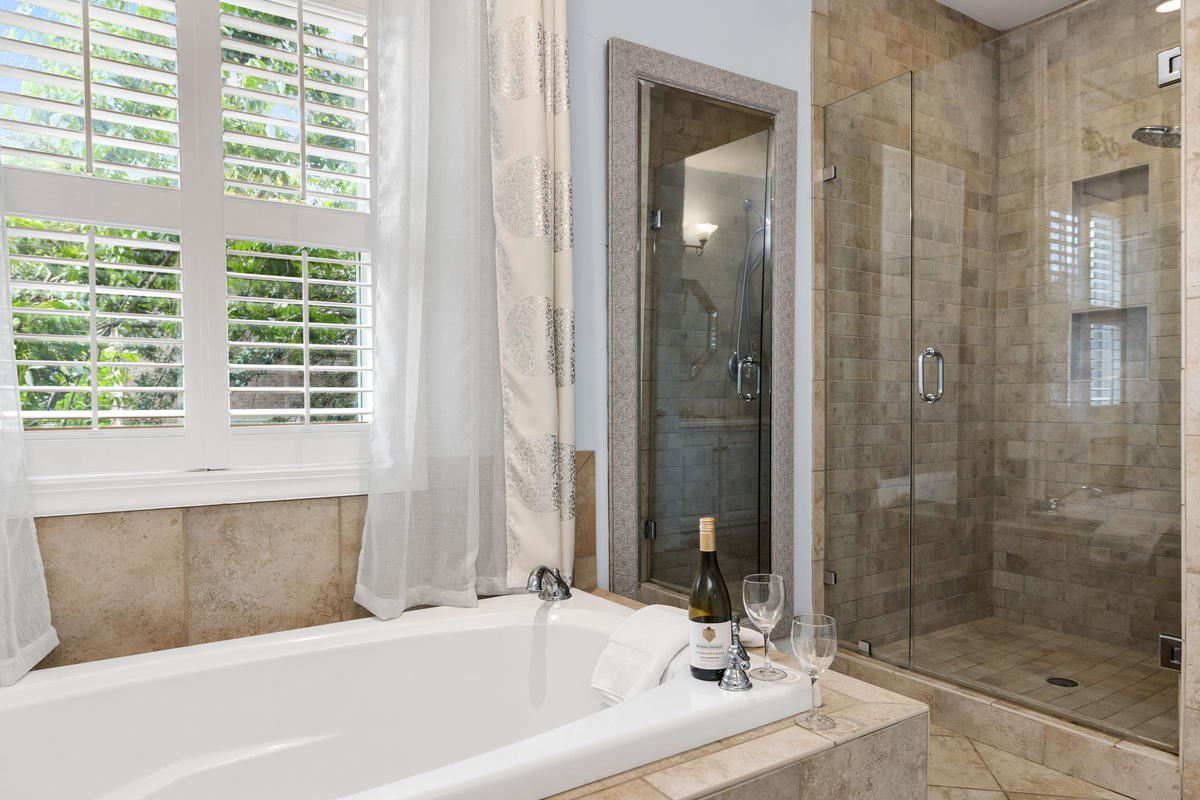 Soaking Tub and Glass Tiled Shower.Ensuite - #1 of 2 King Primary Suites
