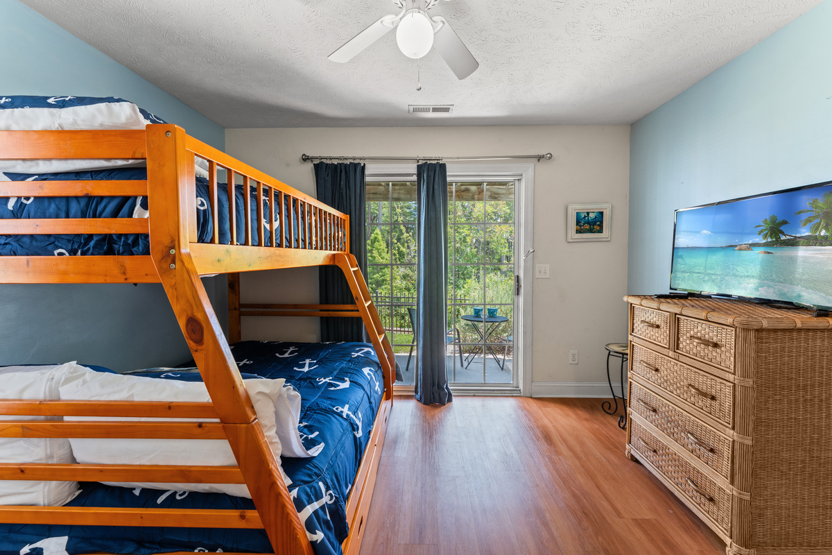 4th Bedroom - Downstairs Bunk bed and outdoor patio access