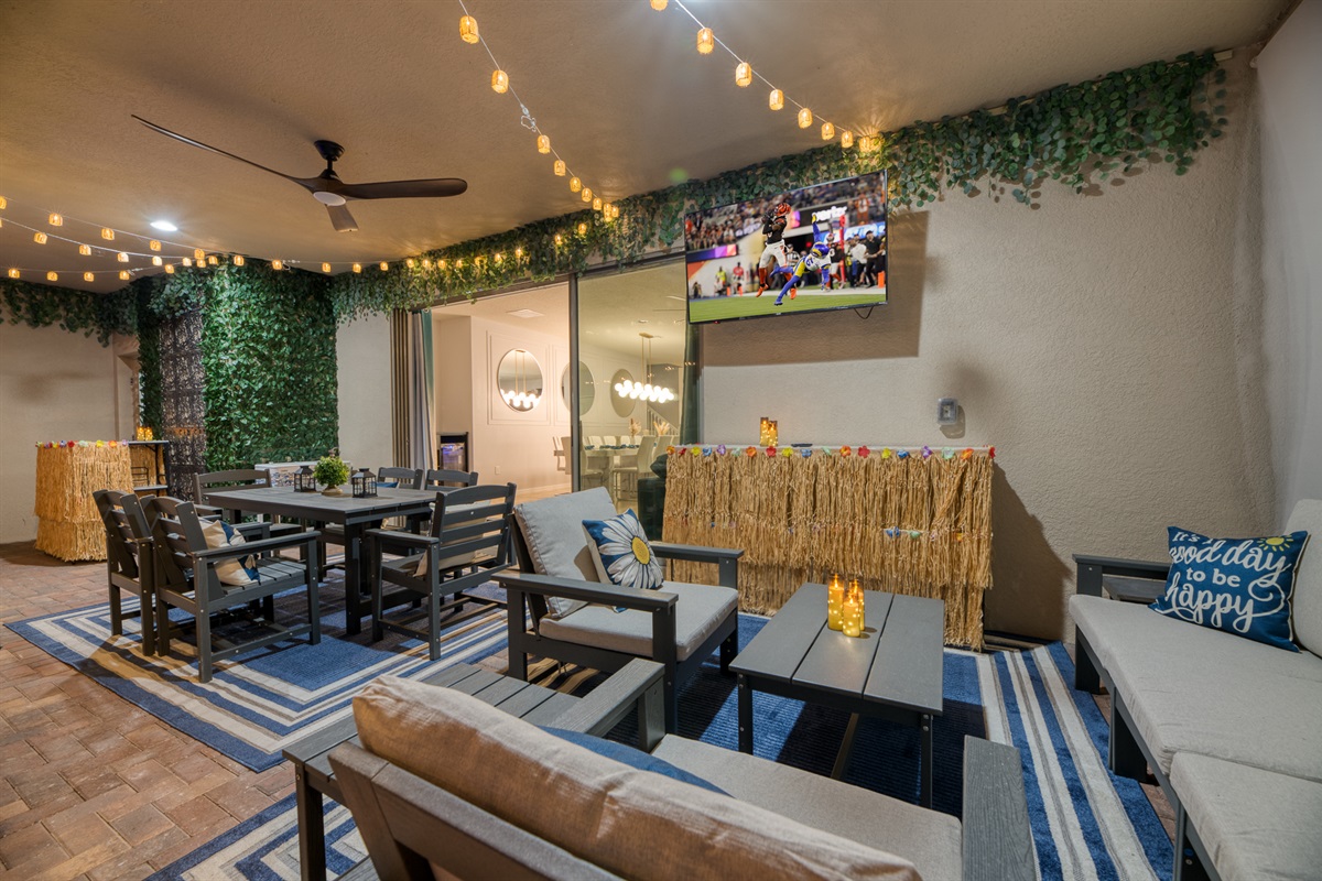 Not only does the lanai have a 150 inch projector screen to watch movies in the pool, it also has a TV on the patio