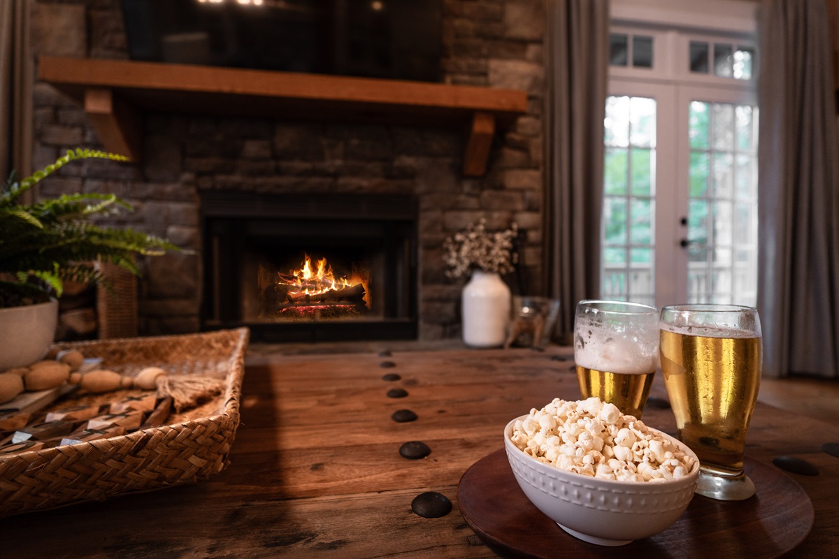 Stay cozy with a wood-burning fireplace, perfect for warming up and creating a relaxing lakehouse atmosphere.