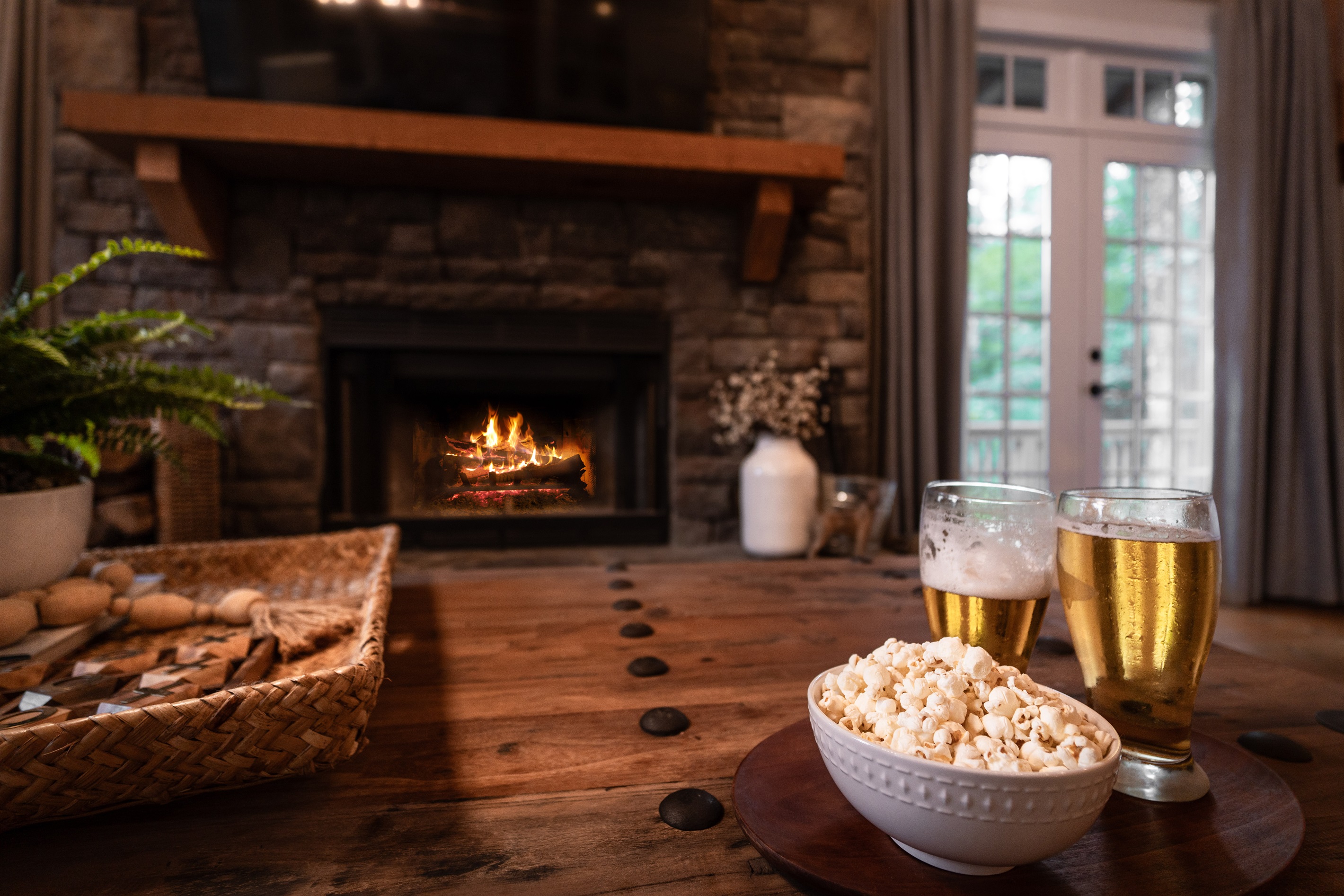 Stay cozy with a wood-burning fireplace, perfect for warming up and creating a relaxing lakehouse atmosphere.