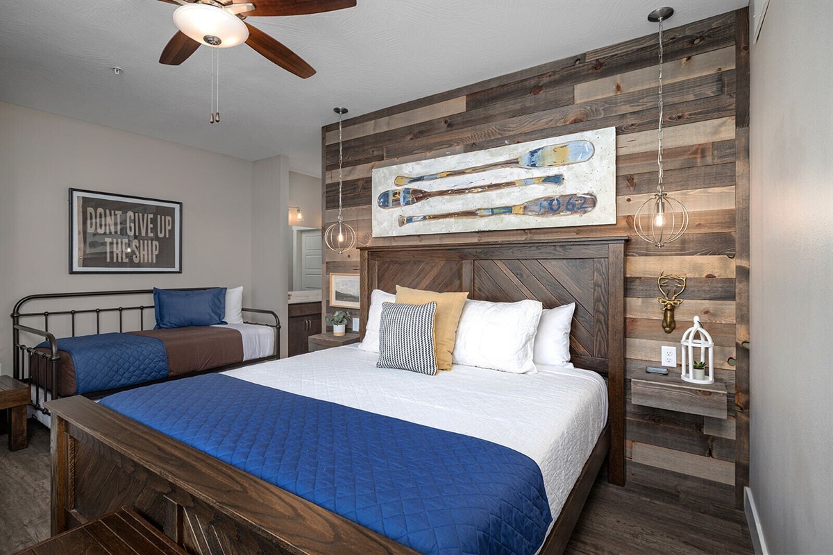 Main Level King Bedroom w/twin daybed and trundle and attached full bathroom