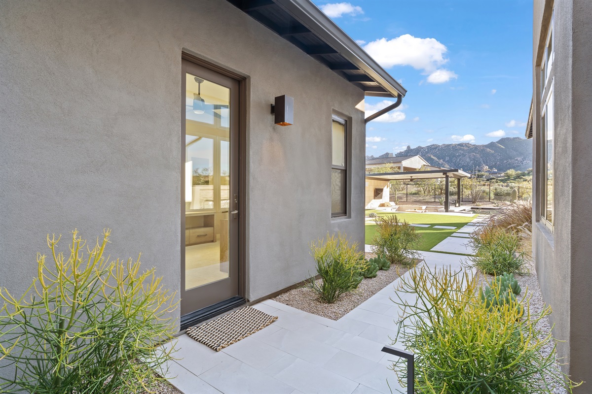 The separate private Casita offers a 5th bedroom, office and bathroom.