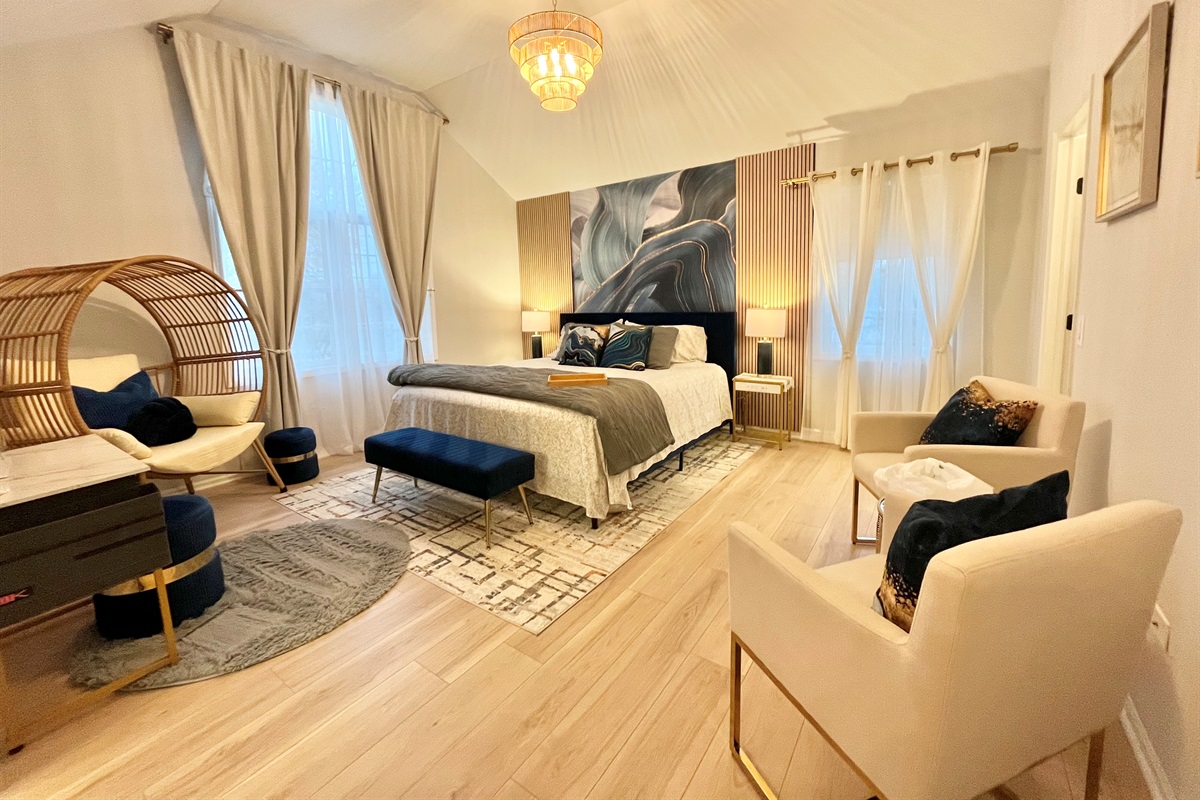 Master bedroom with King bed and Cathedral Ceiling