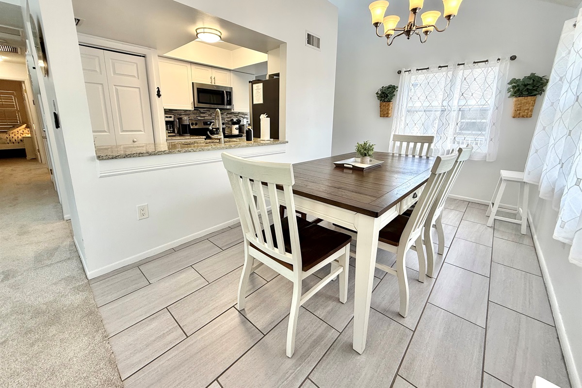 Situated right off the kitchen, this dining area makes serving and entertaining simple.