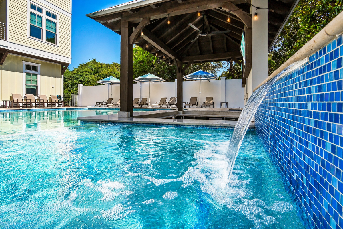 Gather poolside, sip cocktails at the swim-up bar, and unwind beneath the waterfall