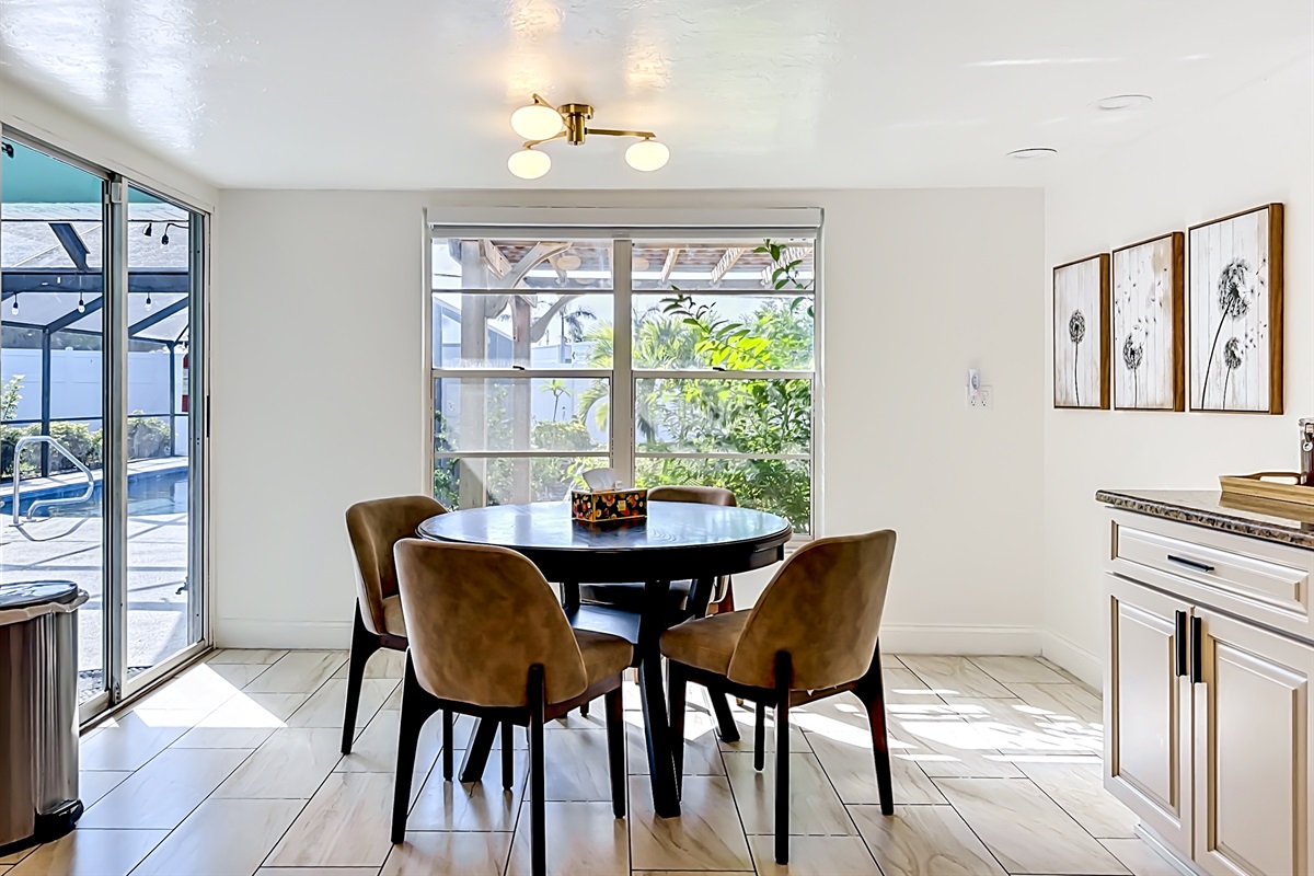 Enjoy a quick meal or your morning cup of coffee, in our cozy kitchen nook, with a direct view of our private pool. 