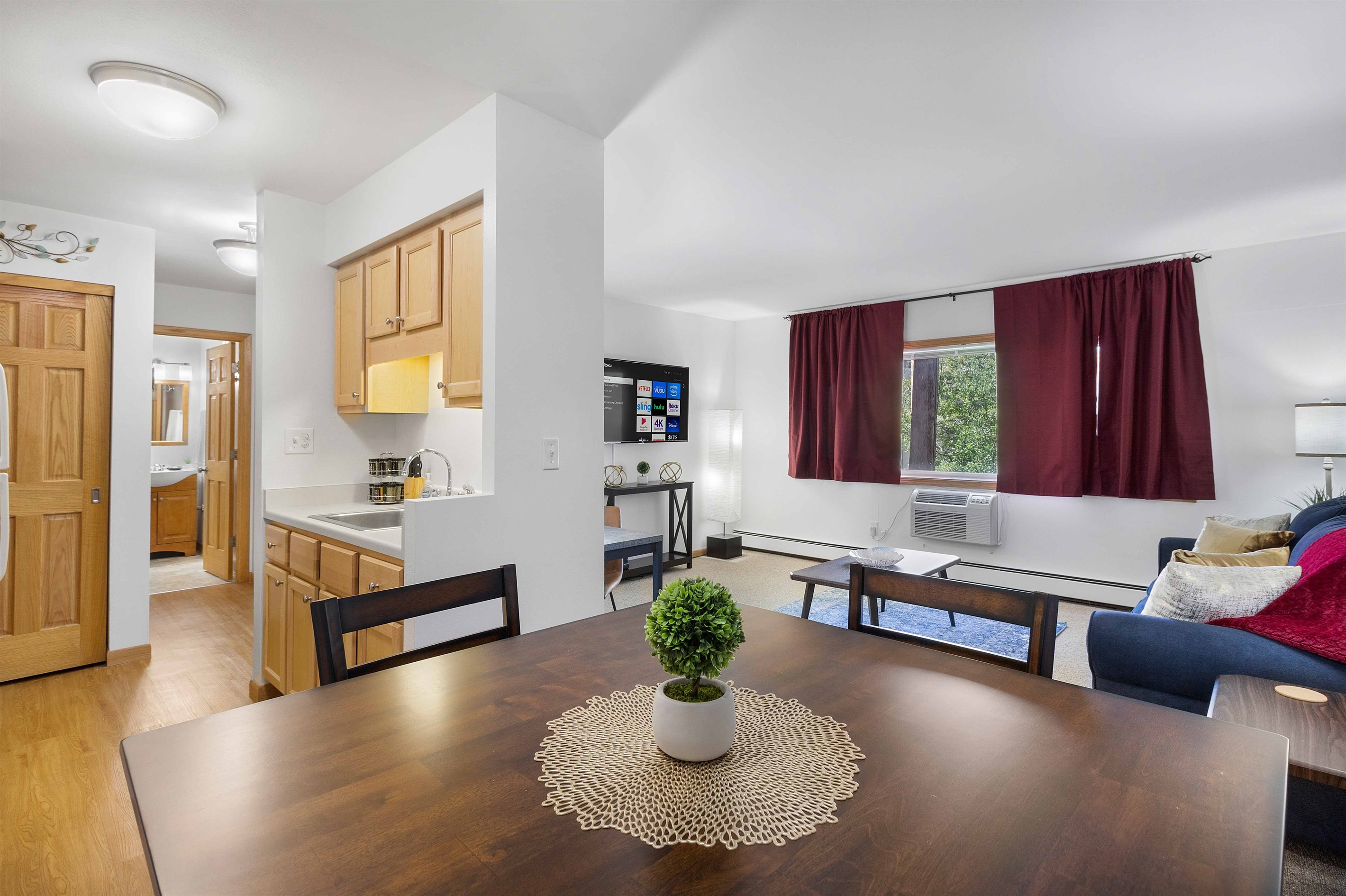 Open concept dining room, living room and kitchen make for a spacious feeling.