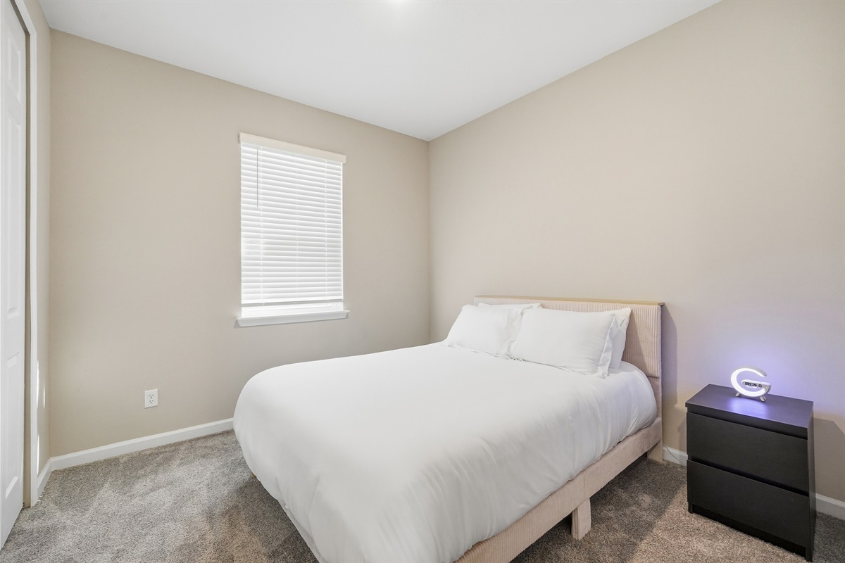 Queen guest bedroom with memory foam mattress