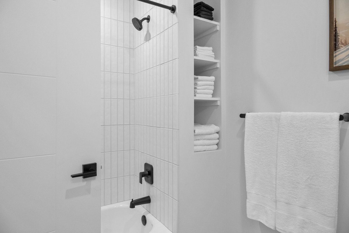 Spacious walk-in shower with contemporary finishes.