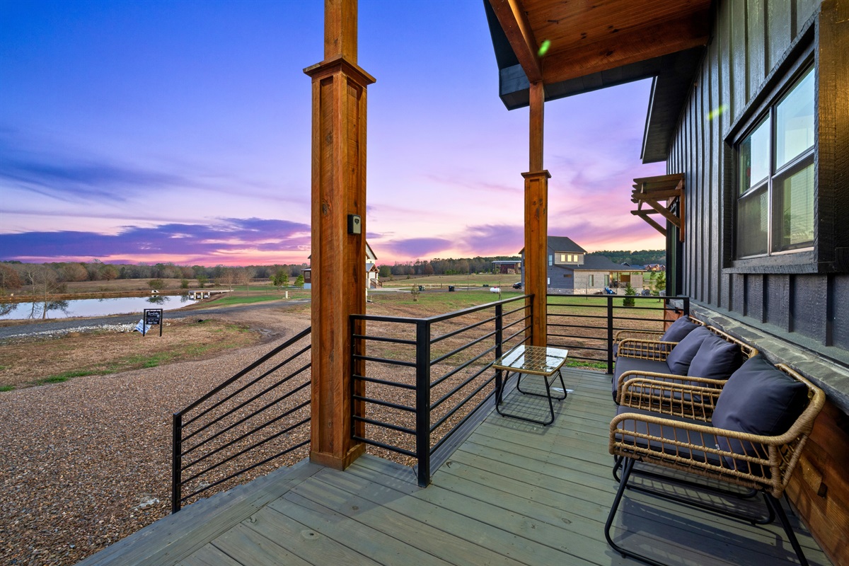 This cozy corner on the deck provides a perfect spot to sip coffee in the morning or unwind as the day winds down.