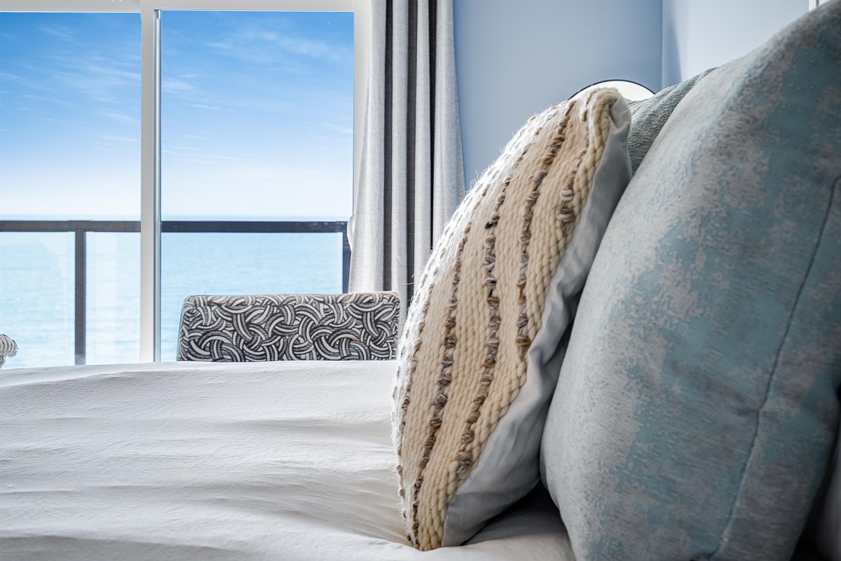 Master Bedroom with King bed and access to second story balcony with calming lake views