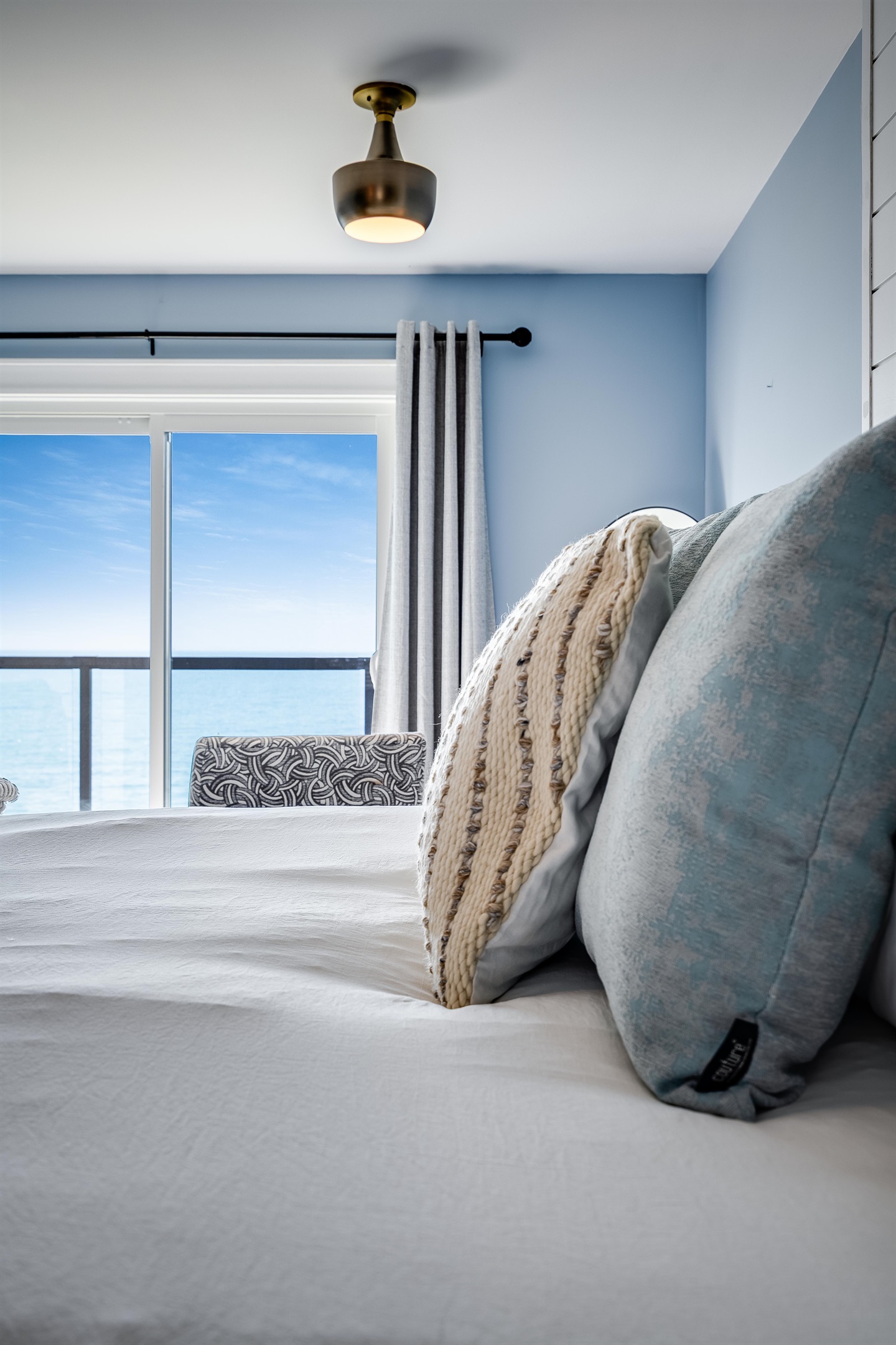 Master Bedroom with King bed and access to second story balcony with calming lake views