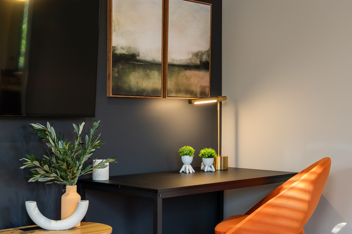Workspace setup within bedroom - great for quick check-ins or remote work if needed