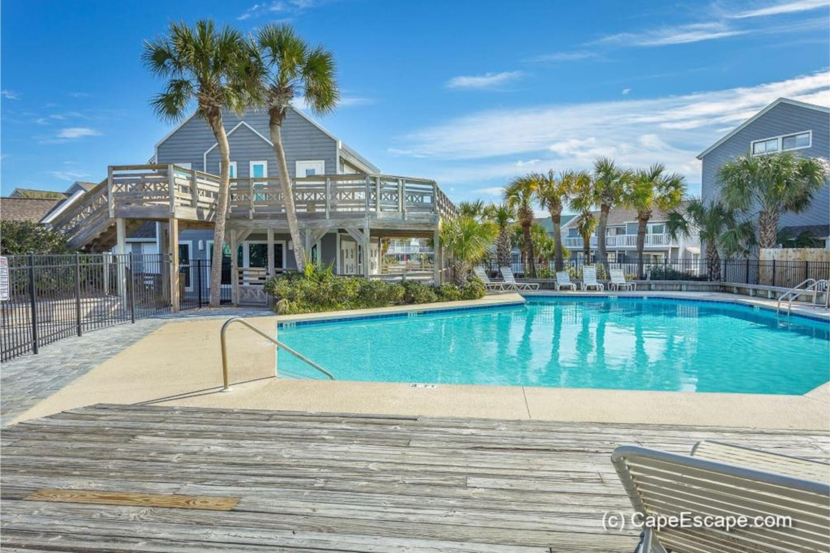 Take a dip in the beachfront community pool directly across from your front door &mdash; Gulf views included.