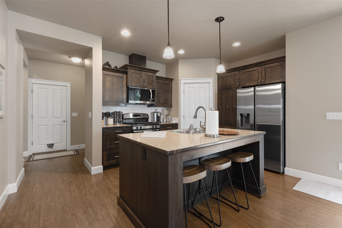 Spacious kitchen island perfect for cooking or casual dining.